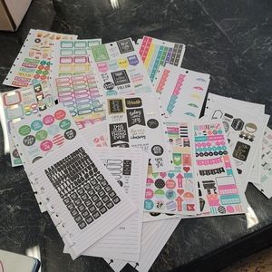 Mixed happy planner sticker books and loose pages